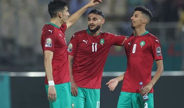 Morocco’s forward Sofiane Boufal (C) is congratulated by teammates after scoring in the match between Morrocco and Ghana in Yaounde, on January 10, 2022. (AFP)