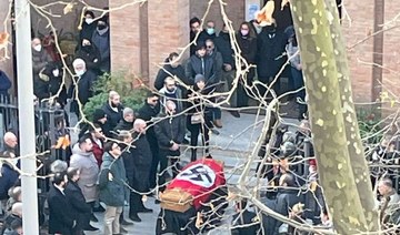 Rome church condemns swastika-draped casket at funeral