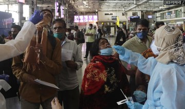 India reports 264,202 new coronavirus infections in past 24 hours