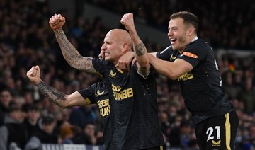 Newcastle United's English midfielder Jonjo Shelvey (C) celebrates with teammates after scoring the opening goal of the English Premier League football match between Leeds United and Newcastle United at Elland Road. (AFP)