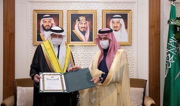 Saudi Arabia's king honors former OIC chief