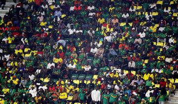 General view of Cameroon fans inside the stadium during the match. (Reuters)
