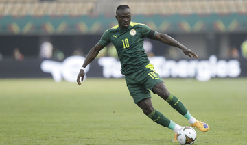 Mané scores but concern over head injury as Senegal into QF