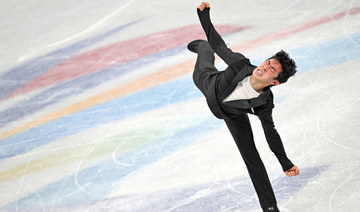 Chen flips, spins way to world-record score at Olympics