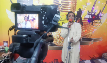 Muhammad Waseem sings at a studio in Hyderabad, Pakistan, on Feb. 7, 2022. (AN photo by Zulfiqar Kunbhar)