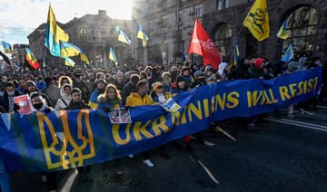 Thousands march in Kyiv to show unity against Russian threat
