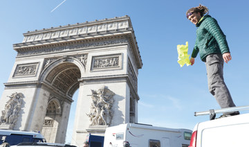 Police fire tear gas as ‘Freedom Convoy’ enters Paris
