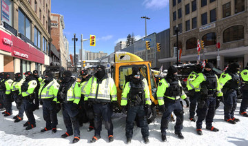 Police deploy to remove demonstrators against Covid-19 mandates in Ottawa on February 18, 2022. (AFP)