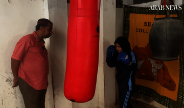 Nimra, a professional fighter in the atomweight category, trains with her father in Karachi, Pakistan. (AN Photo)