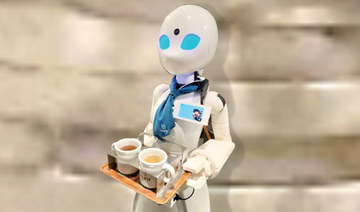 Japanese robot servers allow staff with disabilities to work in Tokyo cafe