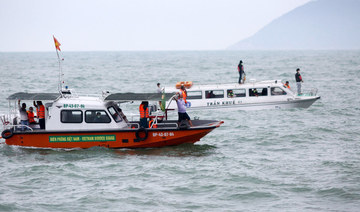 Rescuers look for survivors from search boats after a vessel carrying tourists capsized in the waters between Cu Lao Cham island and Hoi An on Vietnam's central coast on February 26, 2022. (AFP)