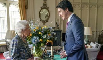 Queen Elizabeth II greets Trudeau in person after COVID-19 scare