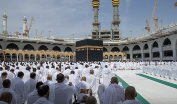Worshipers pray shoulder-to-shoulder at the Two Holy Mosques after COVID-19 restrictions lifted
