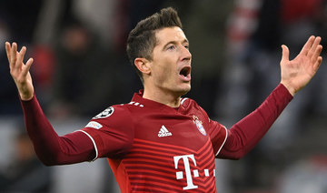 Lewandowski’s 11-minute hat trick helps Bayern advance in champions league