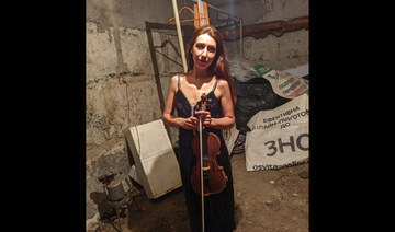 Sheltering from bombs, Ukraine’s ‘cellar violinist’ plays on