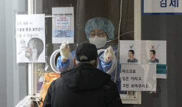 South Korea looks to end COVID-19 restrictions despite record surge in cases, deaths