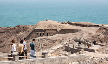 Tourists visit the Sira Fortress overlooking Yemen's southern port of Aden, on February 24, 2022. (AFP)