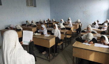 Thousands of Afghan girls return to school as Taliban end ban