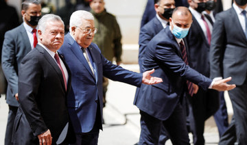 Jordanian King Abdullah is welcomed as he arrives to meet Palestinian President Mahmoud Abbas in Ramallah, in the Israeli-occupied West Bank March 28, 2022. (REUTERS)