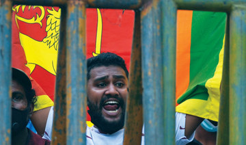 Sri Lankan lawmakers seek interim government to solve crisis