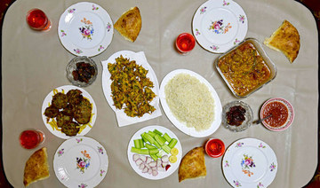 This picture taken on April 3, 2022 shows food plates with traditional food for Muslim devotees to break their fast during the holy fasting month of Ramadan in Kabul. (AFP)