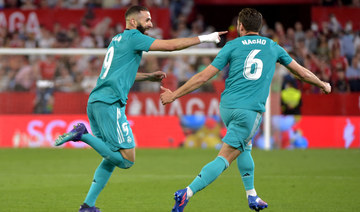 Benzema rallies Madrid past Sevilla, closer to league title