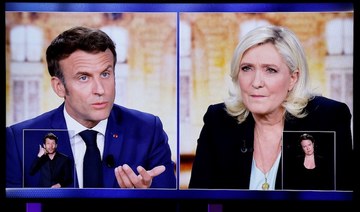 Polls suggest that Emmanuel Macron will narrowly secure a second term against the far right’s Marine Le Pen. (AFP)