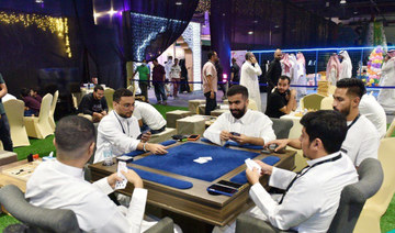 Visitors enjoy playing games with friends and others at Fawanees in Makkah. (Supplied)