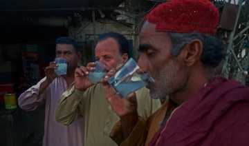 Traditional drink of wrestlers beats heat in southern Pakistan during Ramadan