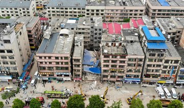 Five rescued from China building collapse