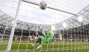 Arsenal heads closer to Champions League return with 2-1 win at West Ham