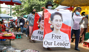 Myanmar’s Suu Kyi charged with bribery as new trial opens