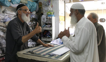 Pakistani with hearing impairment tailors the way for workers with disabilities