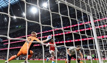 Spurs crush 10-man Arsenal to keep top four bid alive