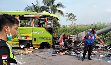 Indonesia tourist bus smashes into billboard, killing 14