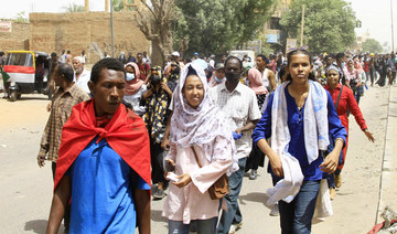 Sudanese demonstrators take to the streets of the capital Khartoum on May 19, 2022. (AFP)