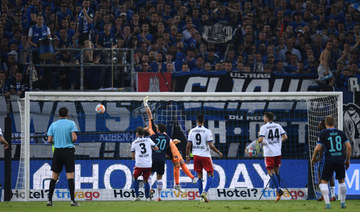 Hertha Berlin keep Bundesliga status with playoff victory at Hamburg