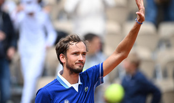 Medvedev eases through at French Open as Rune strikes teen blow