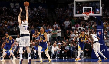 Doncic takes charge as Mavs down Warriors to keep series alive