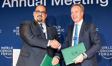 The agreement was signed by Minister of Economy and Planning Faisal Al-Ibrahim and President of the World Economic Forum Borge B