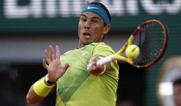 Nadal wins epic four-set clash with Djokovic to make French Open semis
