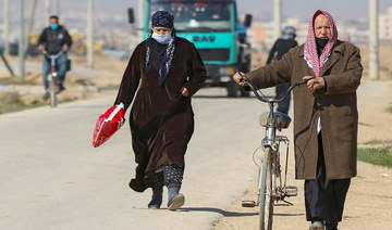 Syrian refugees walk in the Zaatari refugee camp, north of the Jordanian capital Amman. (AFP file photo)