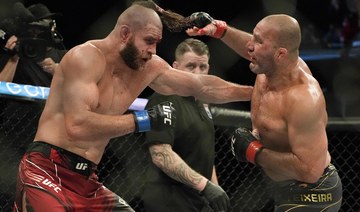 Prochazka takes 205-pound title from Teixeira at UFC 275
