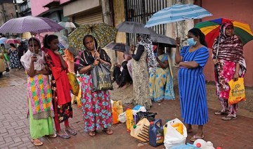 Sri Lanka says economy collapsed, pins last hopes on IMF