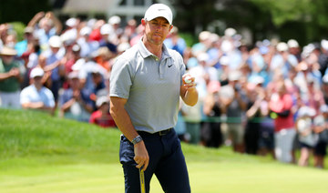 Rory McIlroy, JT Poston share Travelers lead at 8-under 62