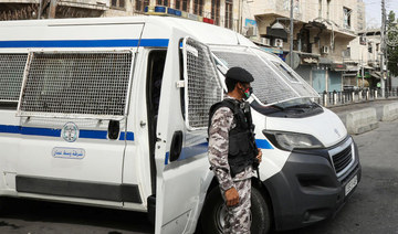 Jordanian police stand guard in downtown Amman, Jordan. (REUTERS)