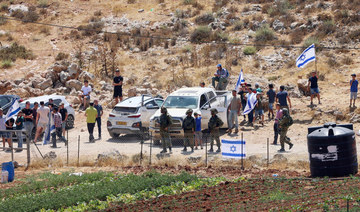Israeli security forces deploy as settlers try to take control of a water spring in the Palestinian village of Qaryut