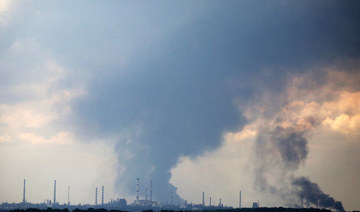 Smoke billows over the oil refinery outside the town of Lysychansk, amid Russia's military invasion launched on Ukraine. (AFP)