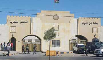 Policemen stand guard outside the State Security Court in the Jordanian capital Amman. (AFP)