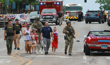 Police arrest suspect after gunman kills six at US July 4 parade